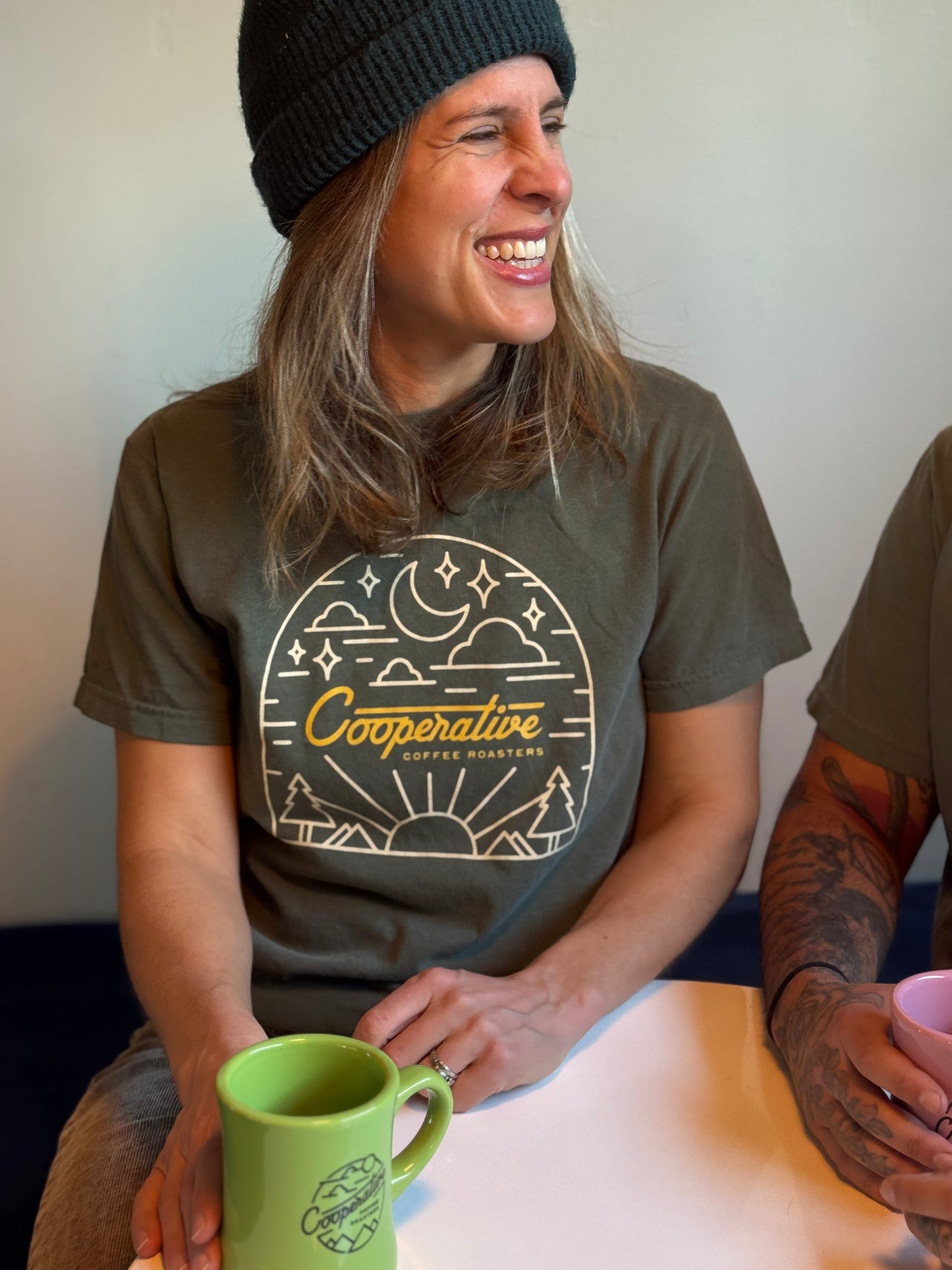 
                  
                    Cooperative Badge Short Sleeve Tee - Green & Gold
                  
                